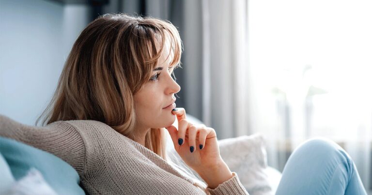 Woman thinking about being pregnant